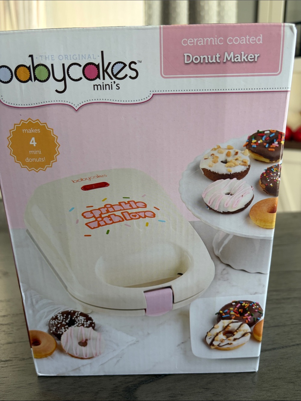 Babycakes Ceramic Coated Mini Donut Maker in Cream and Pink